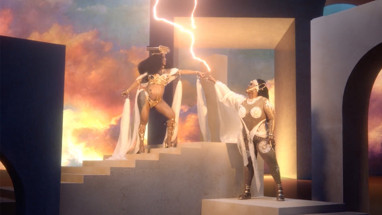 From the ‘Rumors’ music video: Lizzo and Cardi B join fingers, and a lightning bolt emerges